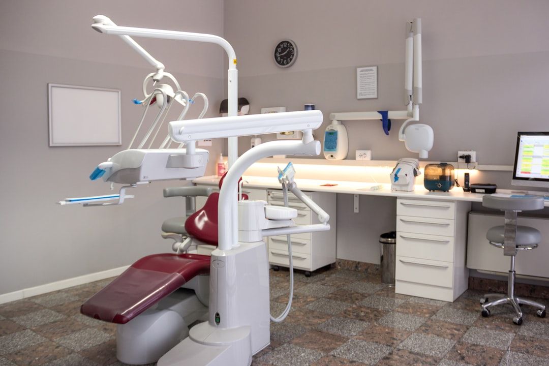 A dental room with a desk and chair